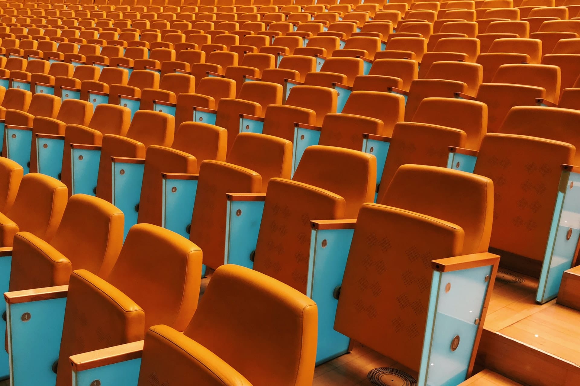 Photograph of empty seats in a conference hall